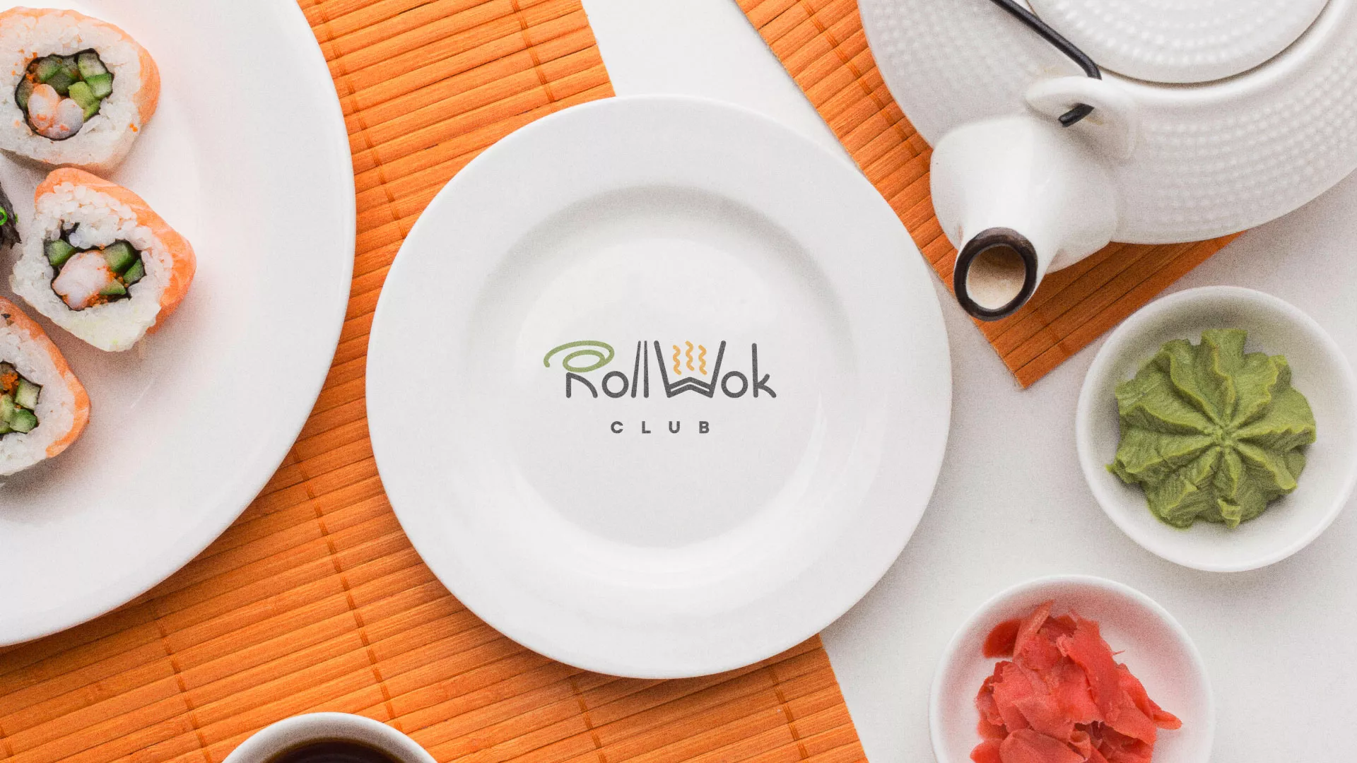 Разработка логотипа и фирменного стиля в Юрге для суши-бара «Roll Wok Club» Разработка логотипа и фирменного стиля в Юрге для суши-бара «Roll Wok Club»